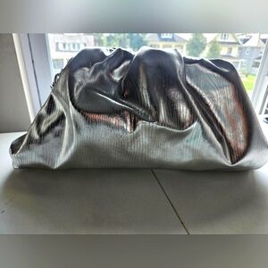Chrome silver oversized clutch with strap